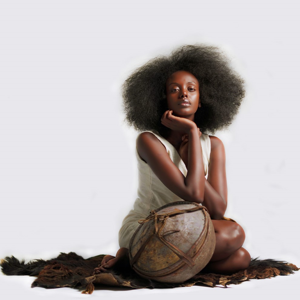 Ethiopian model with leather vessel and artisan craft