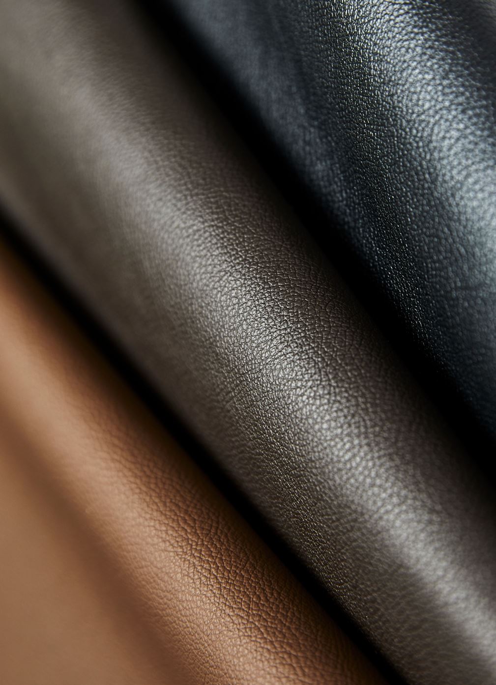 Close view of leather grain in three tones